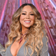 Mariah Carey lights the Empire State Building in celebration of the 25th anniversary of “All I Want For Christmas Is You” on December 17, 2019, in New York City.